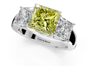 3 Stone Engagement Ring Setting for Fancy Yellow Princess Cut Center with Raised Basket Heads and Prong Head in Platinum