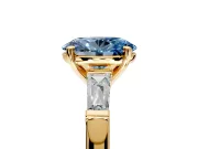 3 Stone Engagement Ring Setting for Fancy Blue Oval Center with Tapered Baguettes, Plain Band and Prong Head in Yellow Gold