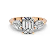 3 Stone Engagement Ring Setting for Emerald Cut Center with Large Pear-Shaped Accents and Prong Head in Rose Gold