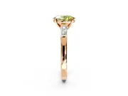 3 Stone Engagement Ring Setting for Fancy Yellow Oval Center with Tapered Baguettes, Plain Band and Prong Head in Rose Gold