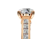 Solitaire Engagement Ring Setting for Round Cut Center with Channel Band and Double Claw Prong Head in Rose Gold