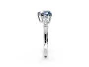 3 Stone Engagement Ring Setting for Fancy Blue Heart-Shaped Center with Baguette Accents and Prong Head in White Gold