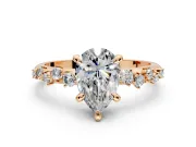 Solitaire Engagement Ring Setting for Pear-Shaped Center with Trailing Leaf Accent Band and Prong Head in Rose Gold