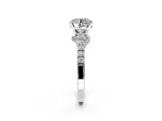 Solitaire Engagement Ring Setting for Round Cut Center with Crossover Accents and Prong Head in Platinum