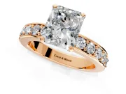 Solitaire Engagement Ring Setting for Radiant Cut Center with Channel-Set Accents and Prong Head in Rose Gold