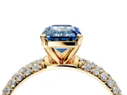 Solitaire Engagement Ring Setting for Fancy Blue Emerald Cut Center with Domed Multi-Row Pave Band and Prong Head in Yellow Gold