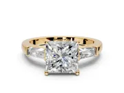 3 Stone Engagement Ring Setting for Princess Cut Center with Tapered Baguettes, Plain Band and Prong Head in Yellow Gold