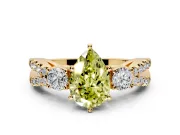 3 Stone Engagement Ring Setting for Fancy Yellow Pear-Shaped Center with Pave Split Shank and Prong Head in Yellow Gold