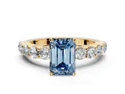 Shared-Prong Engagement Ring Setting for Fancy Blue Emerald Cut Center with Graduated Accents and Prong Head in Yellow Gold