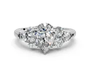 Cluster Engagement Ring Setting for Pear-Shaped Center with Round Cut Accent Frame and Prong Head in White Gold