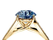 Solitaire Engagement Ring Setting for Fancy Blue Round Cut Center with Cathedral Channel Band and Prong Head in Yellow Gold