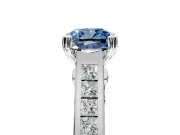 Solitaire Engagement Ring Setting for Fancy Blue Cushion Cut Center with Channel Band and Double Claw Prong Head in Platinum
