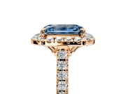Halo Engagement Ring Setting for Fancy Blue Emerald Cut Center with Raised Halo, Pave Band and Prong Head in Rose Gold