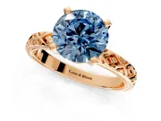 Solitaire Engagement Ring Setting for Fancy Blue Round Cut Center with Milgrain X Pattern Band and Prong Head in Rose Gold