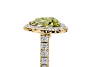 Halo Engagement Ring Setting for Fancy Yellow Heart-Shaped Center with Narrowing Pave Band and Prong Head in Yellow Gold