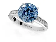 Solitaire Engagement Ring Setting for Fancy Blue Round Cut Center with Channel-Set Accent Band and Prong Head in Platinum