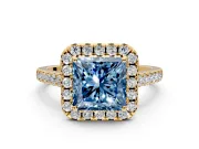 Halo Engagement Ring Setting for Fancy Blue Princess Cut Center with Narrowing Pave Band and Prong Head in Yellow Gold