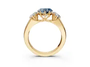 3 Stone Engagement Ring Setting for Fancy Blue Heart-Shaped Center with Raised Basket Heads and Prong Head in Yellow Gold