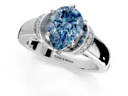 Solitaire Engagement Ring Setting for Fancy Blue Pear-Shaped Center with Wide Band, Pave Collar and Prong Head in Platinum