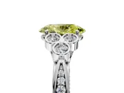 Cluster Engagement Ring Setting for Fancy Yellow Oval Center with Bezel Accent Clusters and Prong Head in Platinum