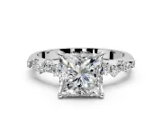 Cluster Engagement Ring Setting for Princess Cut Center with Round Cut Accent Band and Prong Head in Sterling Silver