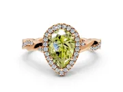 Halo Engagement Ring Setting for Fancy Yellow Pear-Shaped Center with Pave and Plain Twist Band and Prong Head in Rose Gold