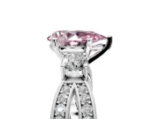 3 Stone Engagement Ring Setting for Fancy Pink Pear-Shaped Center with Pave Twist Band and Prong Head in Platinum