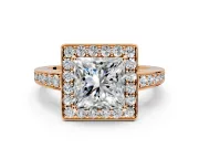 Bezel-Framed Halo Engagement Ring Setting for Princess Cut Center with Pave Band and Prong Head in Rose Gold