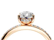 Solitaire Engagement Ring Setting for Pear-Shaped Center with Fine Pave Band and Prong Head in Rose Gold