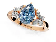 Solitaire Engagement Ring Setting for Fancy Blue Pear-Shaped Center with Marquise Flower Shoulders and Prong Head in Rose Gold