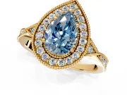 Halo Engagement Ring Setting for Fancy Blue Pear-Shaped Center with Milgrain Rim, Pave Band and Prong Head in Yellow Gold
