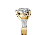 3 Stone Engagement Ring Setting for Heart-Shaped Center with Tapered Baguettes, Plain Band and Prong Head in Yellow Gold