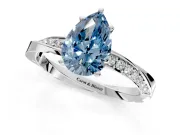 Side Accent Engagement Ring Setting for Fancy Blue Pear-Shaped Center with Accent Shoulders and Prong Head in White Gold