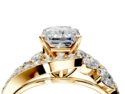 Halo Engagement Ring Setting for Radiant Cut Center with Marquise and Pave Bypass Band and Prong Head in Yellow Gold