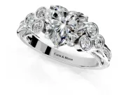 Cluster Engagement Ring Setting for Heart-Shaped Center with Bezel Accent Clusters and Prong Head in Platinum