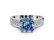 Solitaire Engagement Ring Setting for Fancy Blue Cushion Cut Center with Round Cut Channel Band and Prong Head in White Gold