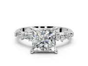 Solitaire Engagement Ring Setting for Princess Cut Center with Trailing Leaf Accent Band and Prong Head in Platinum