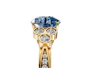 Cluster Engagement Ring Setting for Fancy Blue Round Cut Center with Bezel Accent Clusters and Prong Head in Yellow Gold