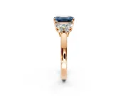 Solitaire Engagement Ring Setting for Fancy Blue Emerald Cut Center with Marquise Flower Shoulders and Prong Head in Rose Gold