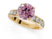 Solitaire Engagement Ring Setting for Fancy Pink Round Cut Center with Channel-Set Accents and Prong Head in Yellow Gold