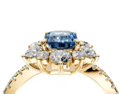 Floral Halo Engagement Ring Setting for Fancy Blue Emerald Cut Center with Pave Accents and Prong Head in Yellow Gold
