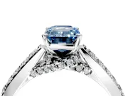 Solitaire Engagement Ring Setting for Fancy Blue Emerald Cut Center with Crossover Accents and Prong Head in Platinum