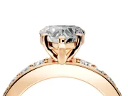 Solitaire Engagement Ring Setting for Heart-Shaped Center with Channel-Set Accents and Prong Head in Rose Gold