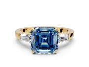 3 Stone Engagement Ring Setting for Fancy Blue Asscher Cut Center with Baguette Accents and Prong Head in Yellow Gold