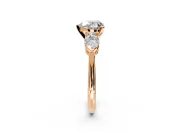3 Stone Engagement Ring Setting for Heart-Shaped Center with Large Pear-Shaped Accents and Prong Head in Rose Gold
