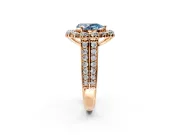Large Accent Halo Engagement Ring Setting for Fancy Blue Pear-Shaped Center with Pave Split Shank and Prong Head in Rose Gold