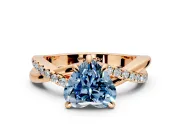 Solitaire Engagement Ring Setting for Fancy Blue Heart-Shaped Center with Half-Pave Crossover Band and Prong Head in Rose Gold