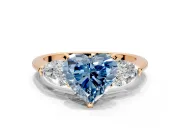 3 Stone Engagement Ring Setting for Fancy Blue Heart-Shaped Center with Large Pear-Shaped Accents and Prong Head in Rose Gold