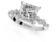 Solitaire Engagement Ring Setting for Princess Cut Center with Trailing Leaf Accent Band and Prong Head in Platinum