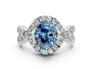 Halo Engagement Ring Setting for Fancy Blue Oval Center with Pave Infinity Twist Band and Prong Head in Platinum